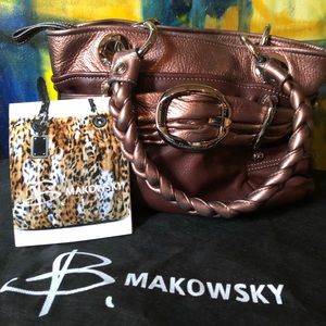 B. Makowsky brown/rose gold leather handbag